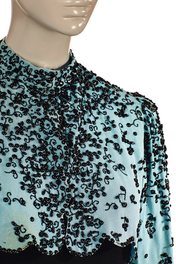 Schiaparelli A bolero jacket in ice blue crepe  1940  Estimate €15,000-20,000 £14,000-18,000 $21,000-27,000.jpg