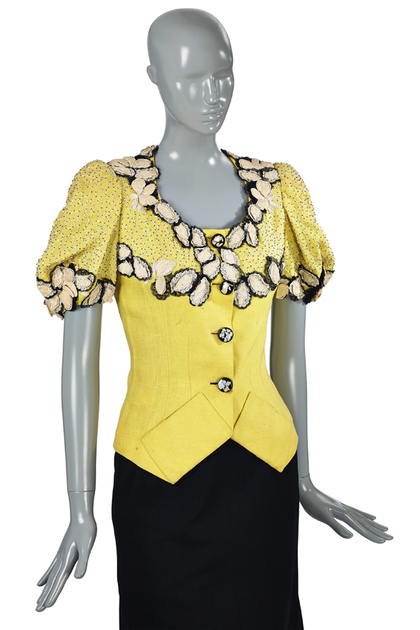 Schiaparelli Yellow fitted jacket, with beadwork and black and white floral trim, 1940s €10-15,000.jpg